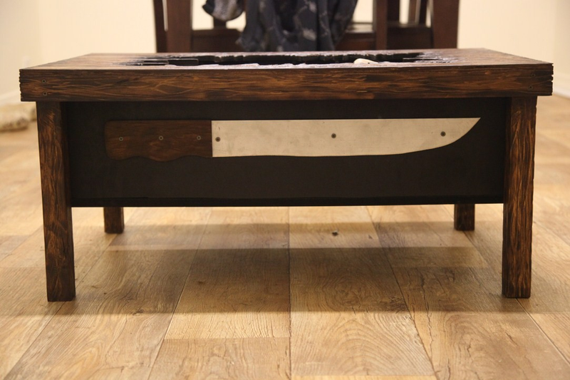 Illustration for article titled The Decaying Body Of Friday The 13th's Jason Lies Inside This Table